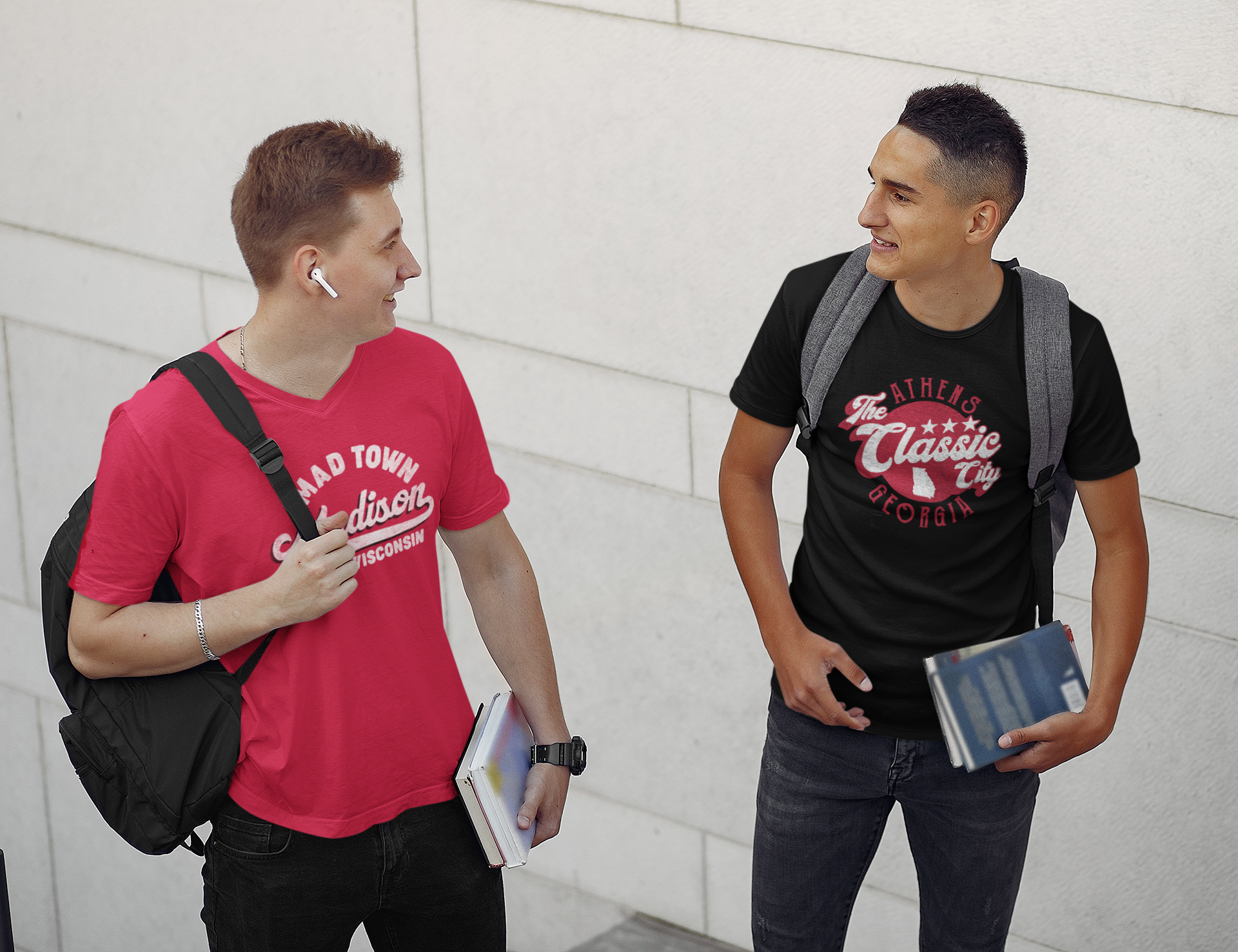 two men wearing backpacks wearing teambrown merchandise